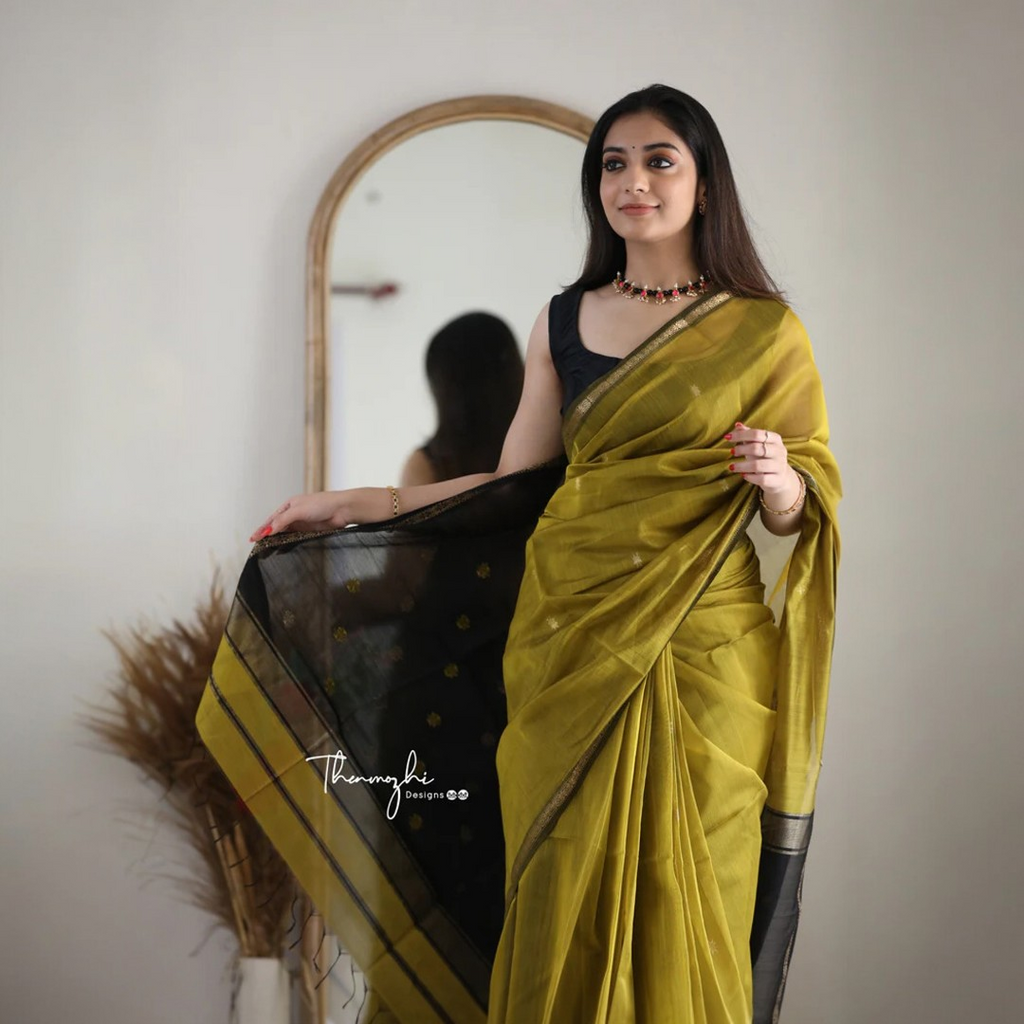 Mehendi Green Silk Saree with Black & Gold Zari Border – Elegant Festive & Occasion Wear