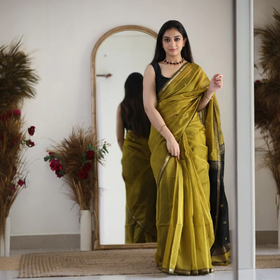 Mehendi Green Silk Saree with Black & Gold Zari Border – Elegant Festive & Occasion Wear