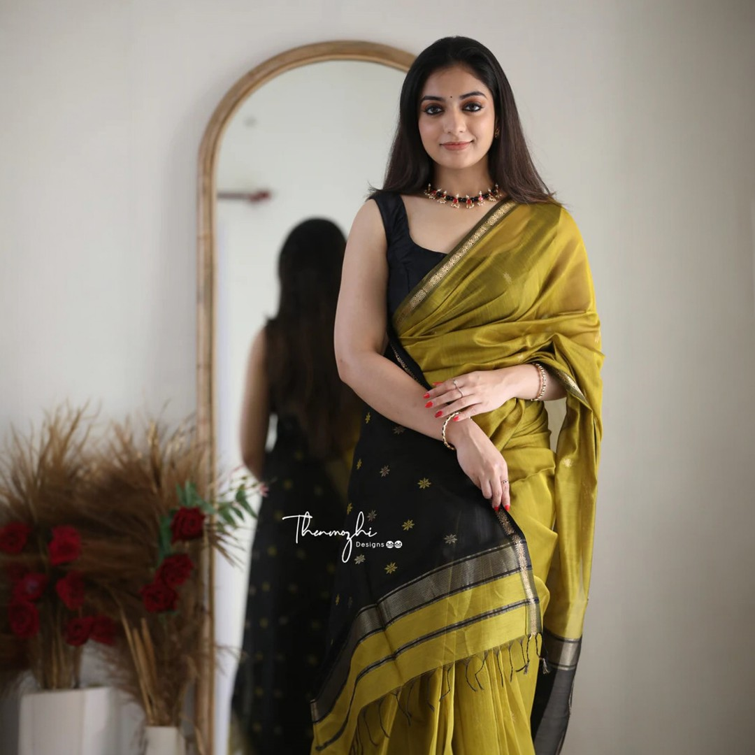 Mehendi Green Silk Saree with Black & Gold Zari Border – Elegant Festive & Occasion Wear