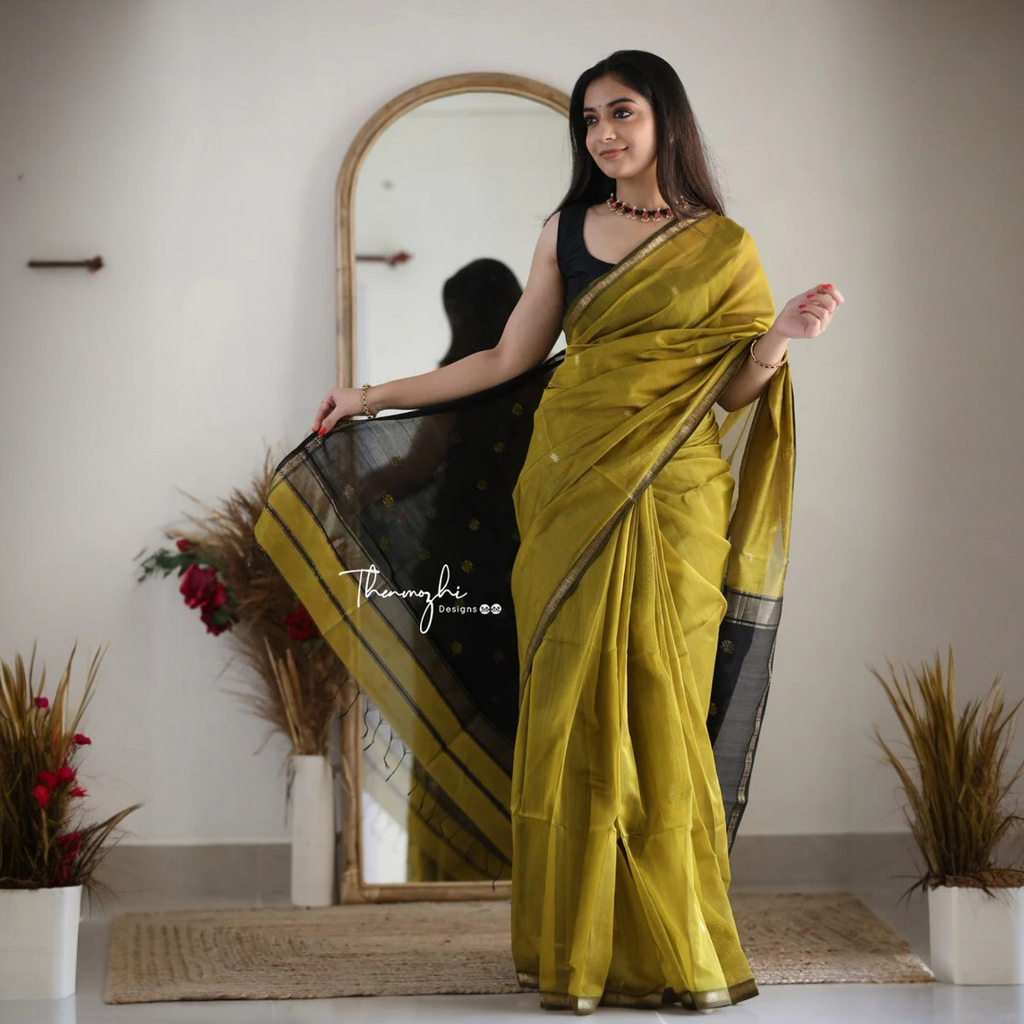 Mehendi Green Silk Saree with Black & Gold Zari Border – Elegant Festive & Occasion Wear