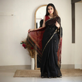 Royal Black Silk Saree with Gold Zari Border & Red Contrast Pallu – Timeless Festive Elegance